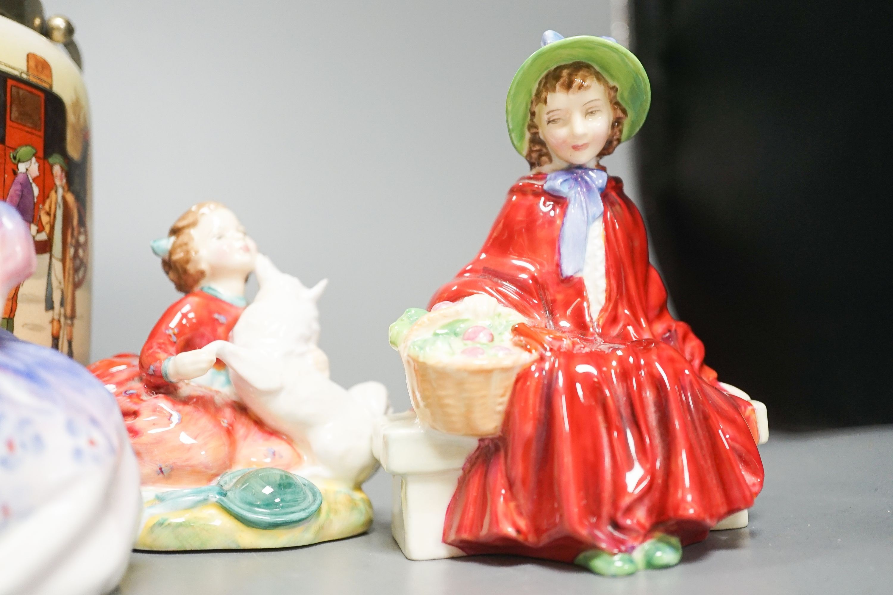 A series ware Doulton biscuit barrel , three Doulton figures, Monica HN1967, Home Again HN2167, LindaCorp 1952, a Crown Staffordshire bird and a Belleek vase.